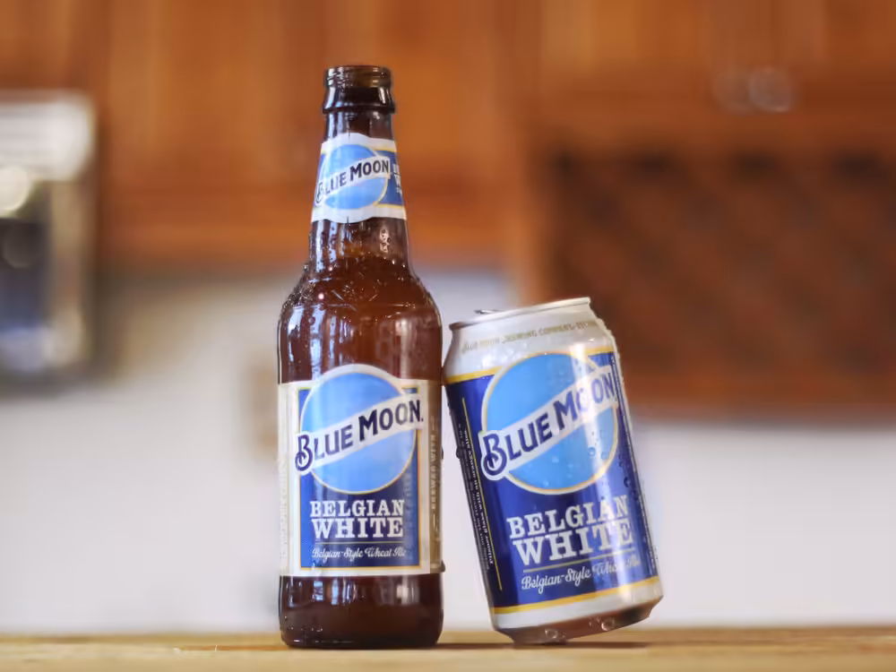 Blue moon belgian white ale lifestyle image bottle and can fb post